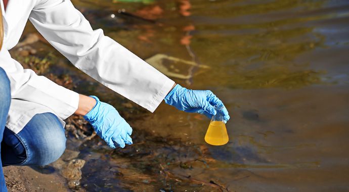 Environmental Tester Collecting Samples, Which Is Representative Of M3&Amp;Apos;S Services.