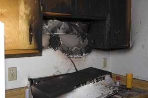 fire damage over stove in kitchen
