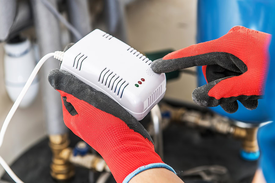 Having Carbon Monoxide and Nature Gas Detector Inside a House. Safety Device.