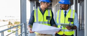 Two construction consultants discussion project about the environment.