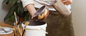 Ceramic Artist Man glazing on master class