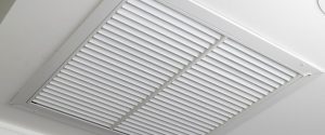 A white ceiling vent